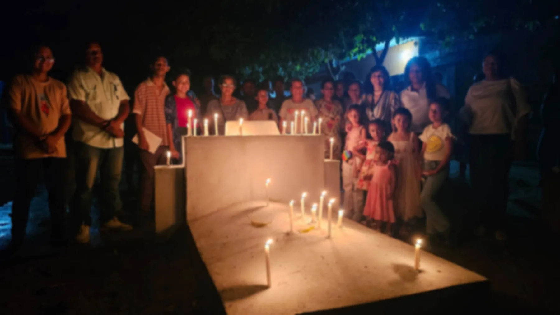 A gathering around the symbolic tombstone, from the Macondo.Live event archive.